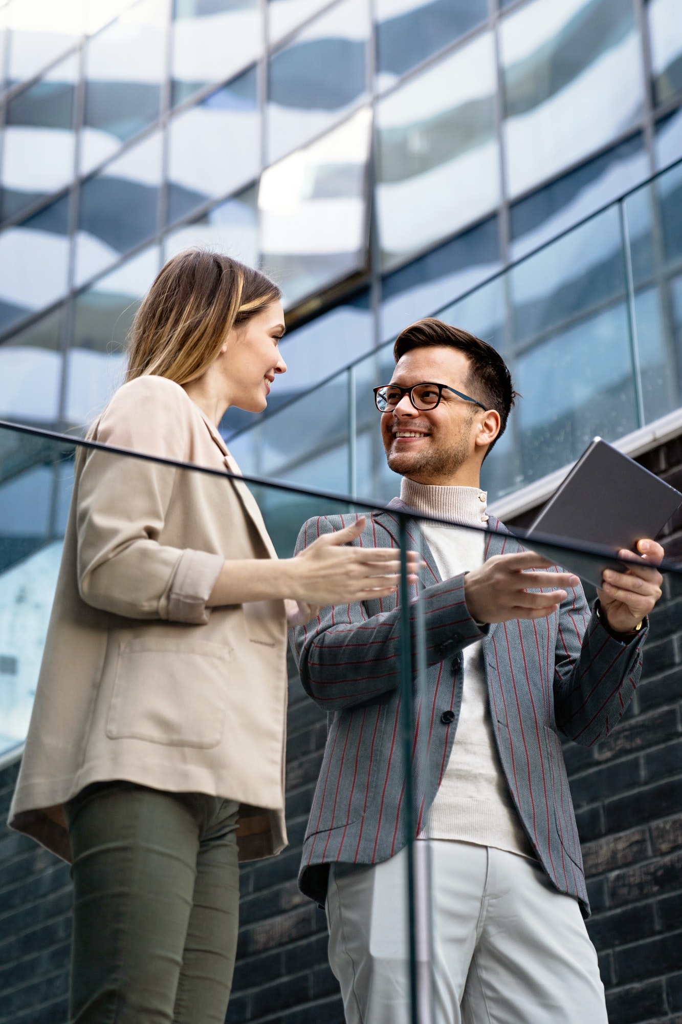 successful-business-people-designer-enjoying-work-together-business-people-tecgnology-concept